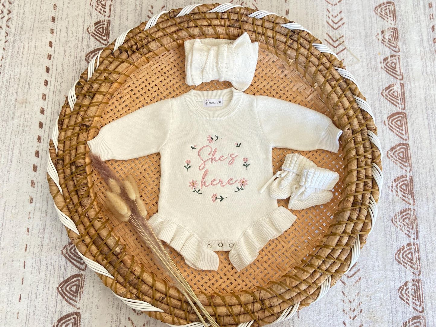 Personalized Baby Ruffle Romper: Embroidered floral she is here Newborn Outfit