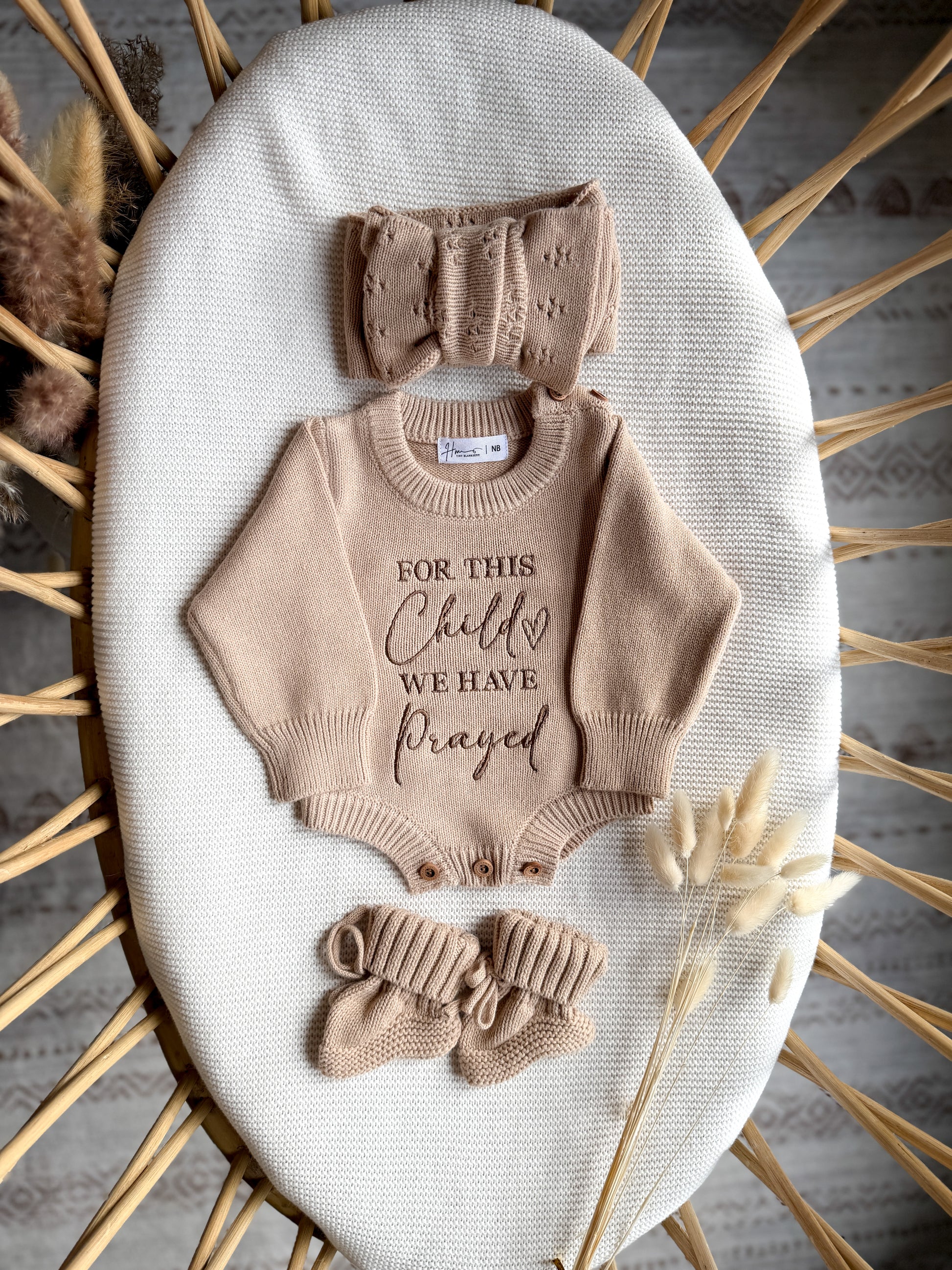 Embroidered for this child we have prayed knit romper